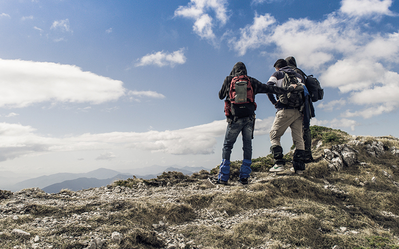 Group looking out at the top of a hill