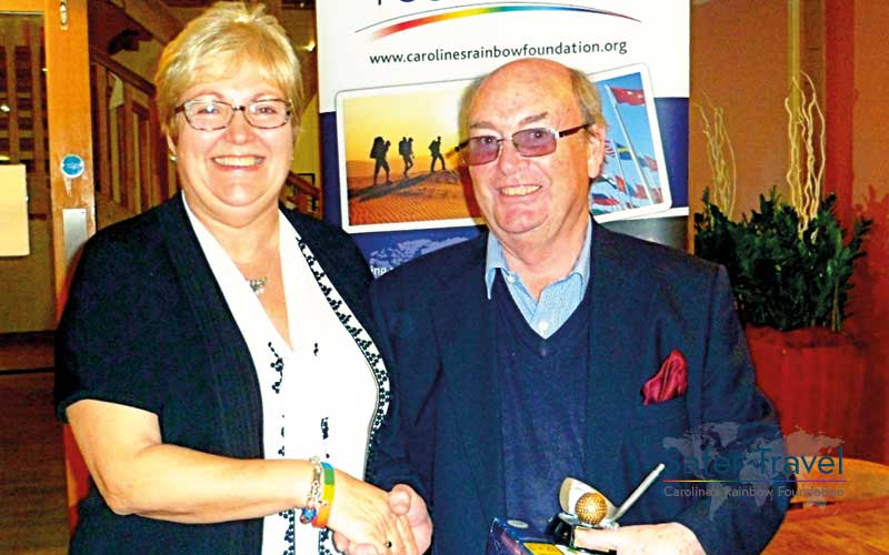 Marjorie Marks-Stuttle shaking hands