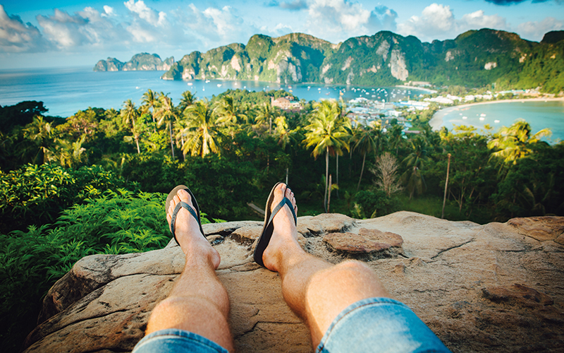 Man relaxing on a rock