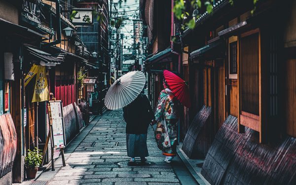 People walking down quiet Japan street