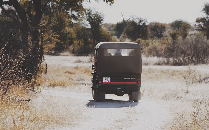 Safari truck driving away