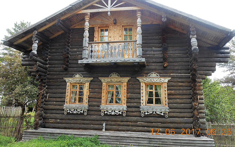 Log cabins with fancy windows