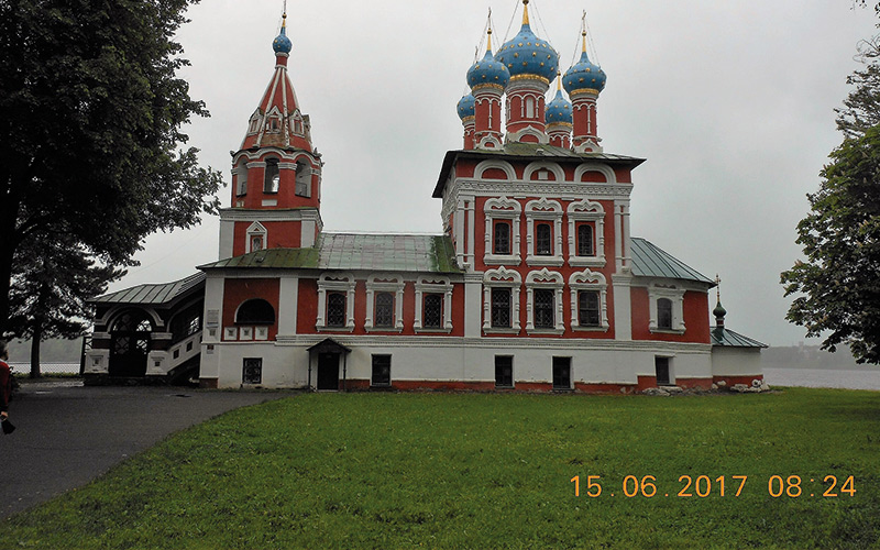 Red and white building with blue and white spires