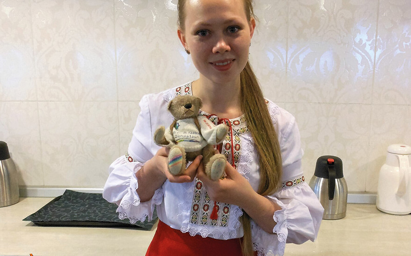 Girl with Rainbow Bear