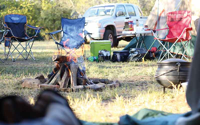 Chairs around a campfire