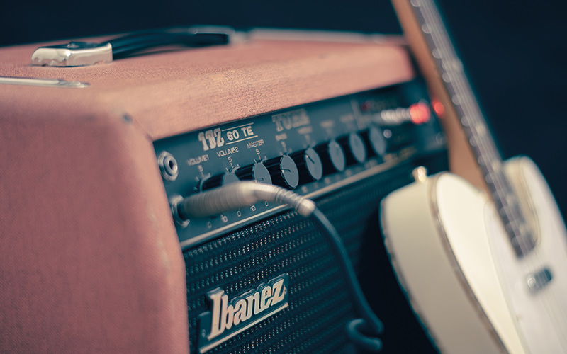 Guitar plugged into amp