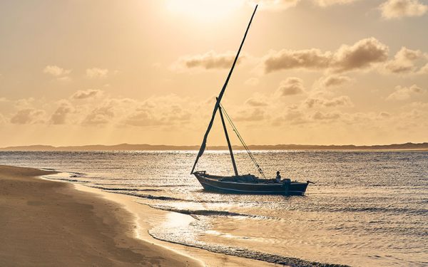 Boat on Lamu beach at sunset