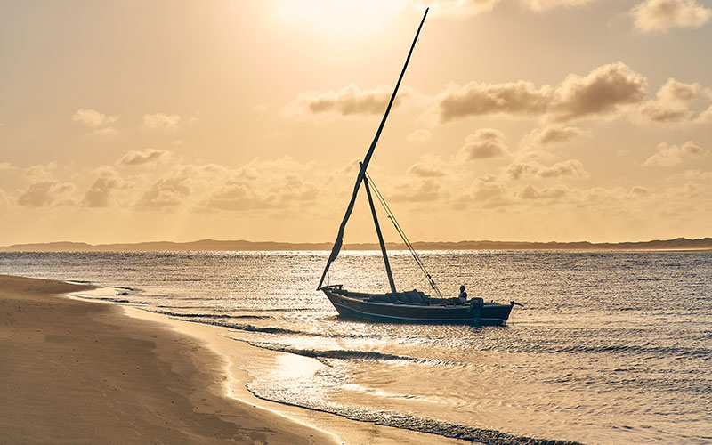 Boat on Lamu beach at sunset