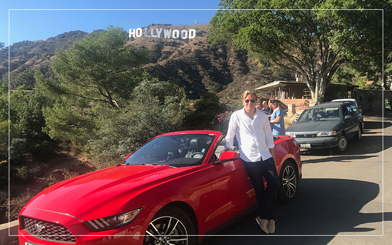 Richard Stuttle with a Ford Mustang in California