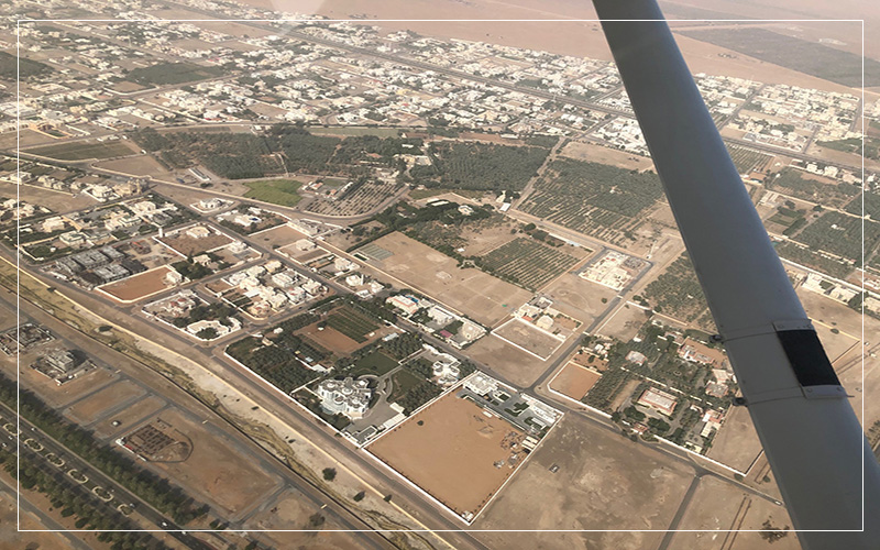 Looking out at Dubai via plane