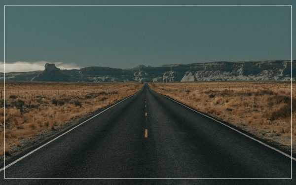 Empty road dark skies