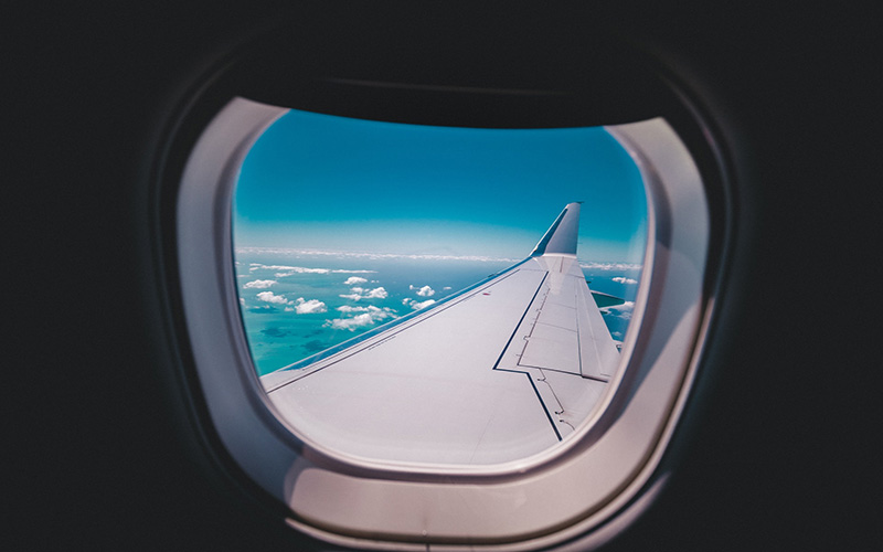 Looking out the window of a plane midair