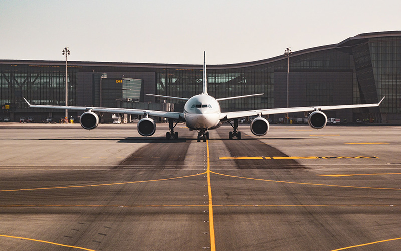 aeroplane on runway at airport